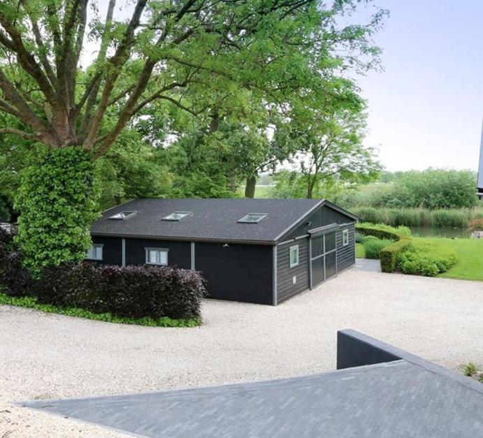Vakantiehuis Onder De Peppel Met Sauna En Jacuzzi Wijk en Aalburg Bagian luar foto